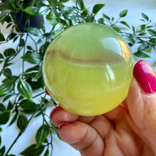 Load image into Gallery viewer, Mango Fluorite Sphere 5cm
