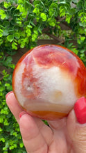 Load and play video in Gallery viewer, Carnelian Sphere 6.5cm from Madagascar
