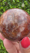 Load and play video in Gallery viewer, Fire Quartz Sphere from Madagascar with stand. Approx 5.5cm
