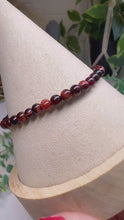 Load and play video in Gallery viewer, Red Tigers Eye 4mm Beaded Bracelet|Consciously Sourced|Gemstone Stretch Bracelet|Crystal Beaded Bracelet
