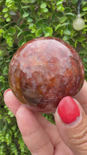 Load and play video in Gallery viewer, Fire Quartz Sphere from Madagascar with stand. Approx 5.5cm
