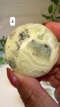 Load and play video in Gallery viewer, Green Maligano Jasper Round Palm Stones from Indonesia
