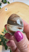 Load and play video in Gallery viewer, Carnelian Egg with Acrylic Stand
