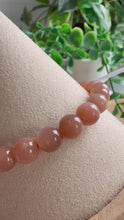 Load and play video in Gallery viewer, Peach Moonstone 6/7 mm Stretch Beaded Bracelet
